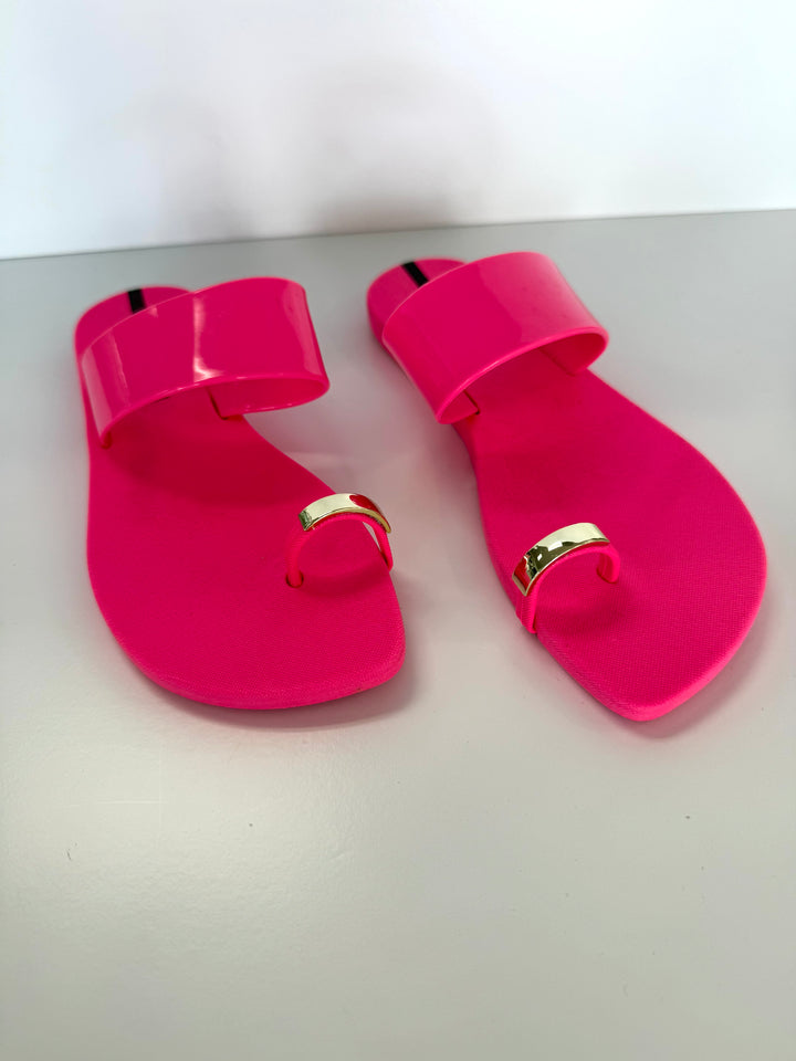 Voices Anello pink and gold toe ring sandal with stylish straps, perfect as a fashionable accessories piece.