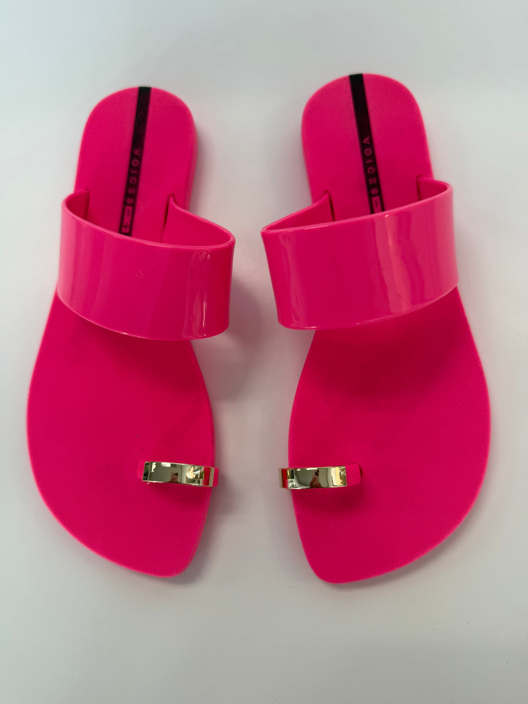 Voices Anello pink and gold sandal with stylish strap design, perfect as a fashionable accessory for summer outfits.