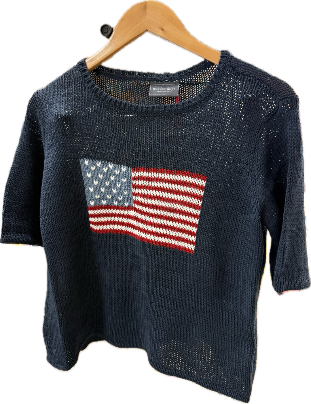 Wooden Ships flag half sleeve sweater, casual tops with a patriotic flag design, soft knit fabric, worn as a stylish everyday top.