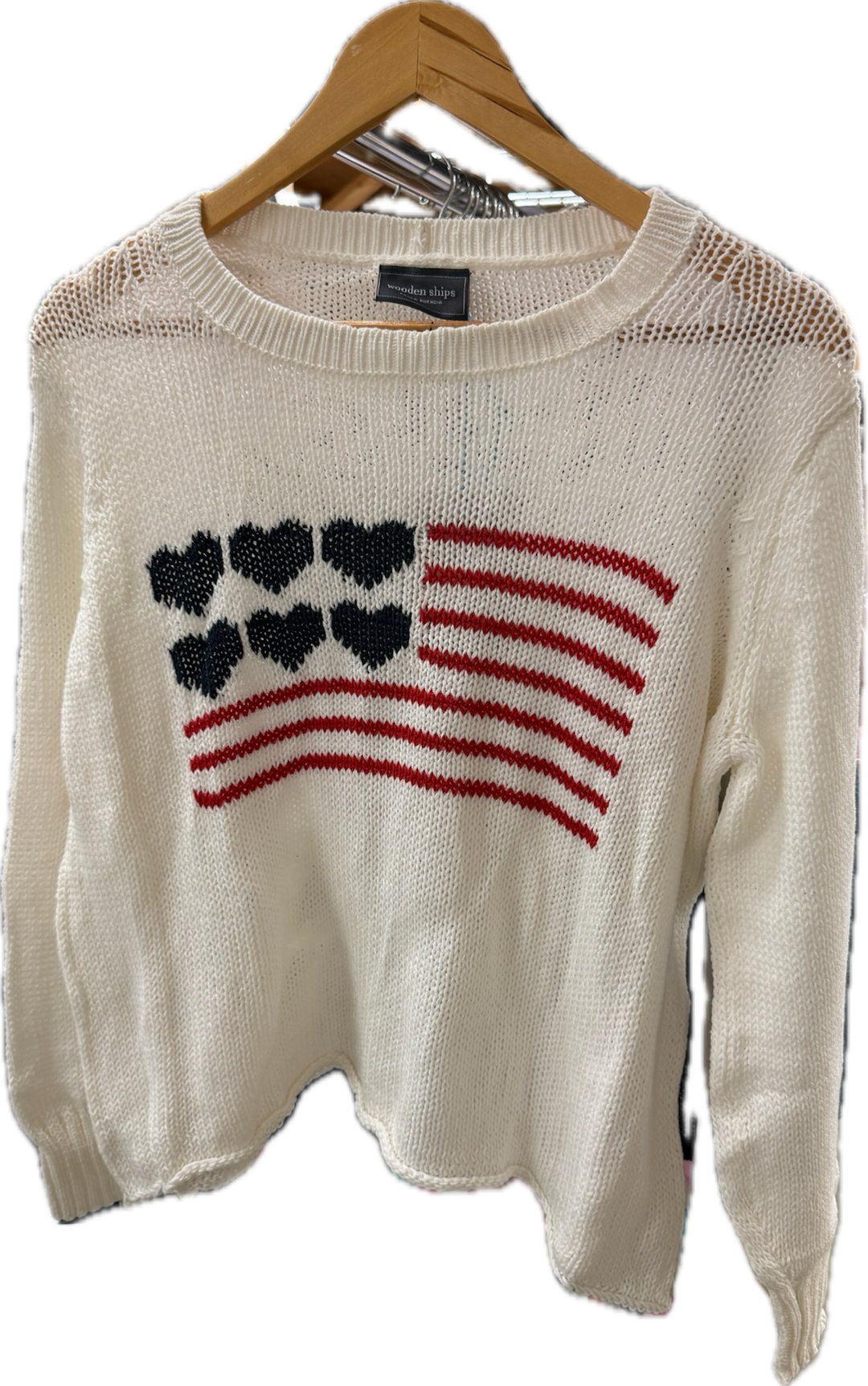 Wooden Ships love flag sweater, a cozy tops garment featuring a colorful love flag design on soft fabric.
