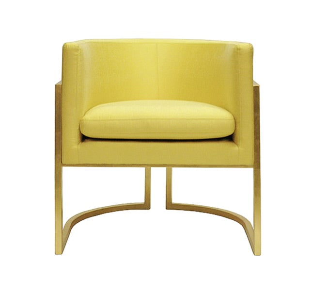 Worlds Away barrel frame chair with plush upholstery and wooden legs, showcasing a stylish, modern furniture piece for living rooms.