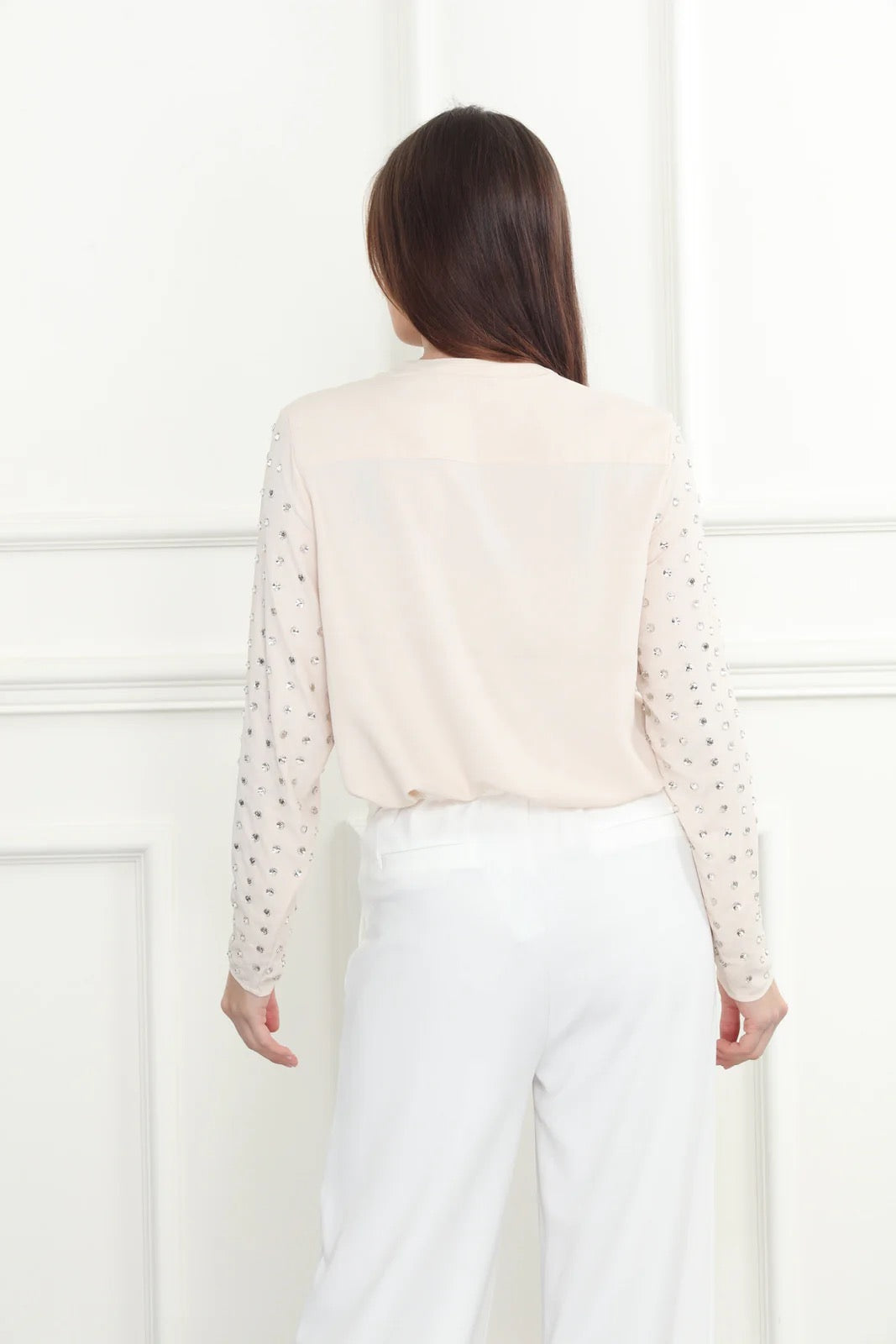 Wide leg trousers from Zero Degrees Celsius Inc, featuring a relaxed fit and classic design, displayed on a model.