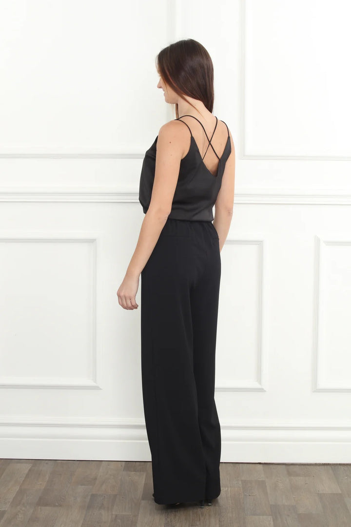 Wide leg trousers from Zero Degrees Celsius Inc, stylish and comfortable bottoms with a relaxed fit and flowing silhouette.
