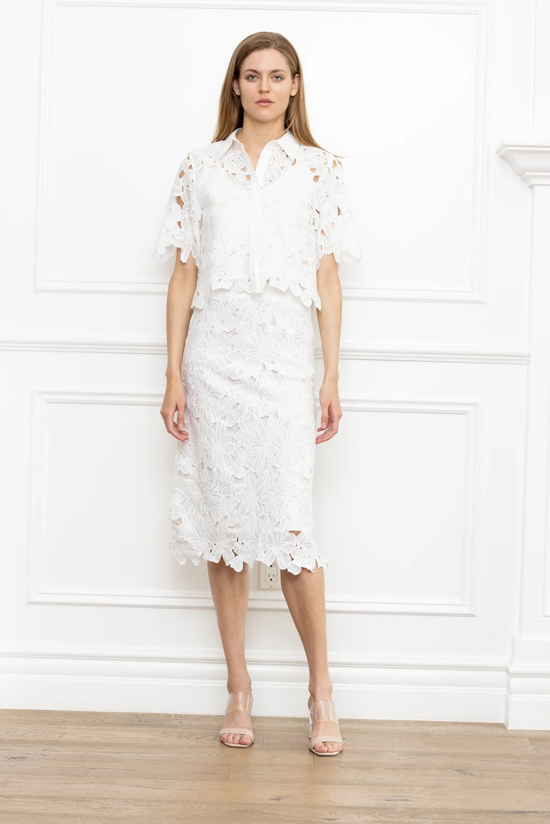 Lace-lined skirt from Zero Degrees Celsius Inc, stylish bottoms with delicate lace detail and a sleek fit.
