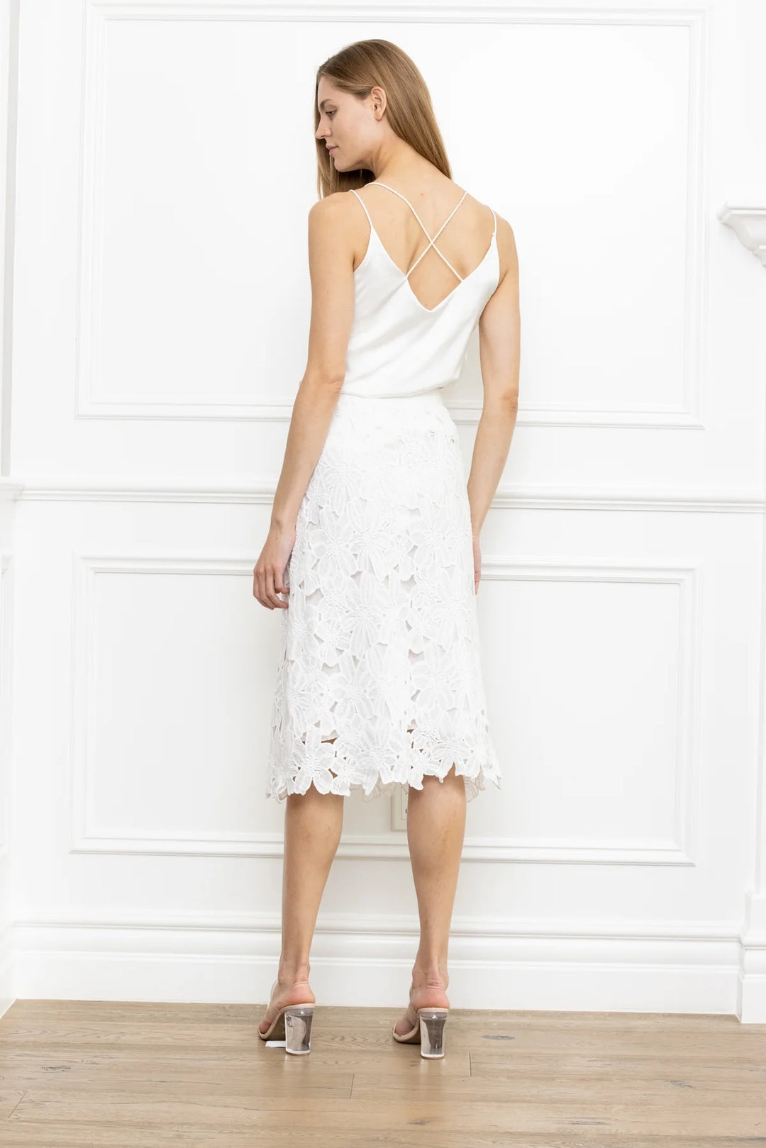 Lace-lined skirt from Zero Degrees Celsius Inc, stylish bottoms with detailed lace trim and flowing fabric.