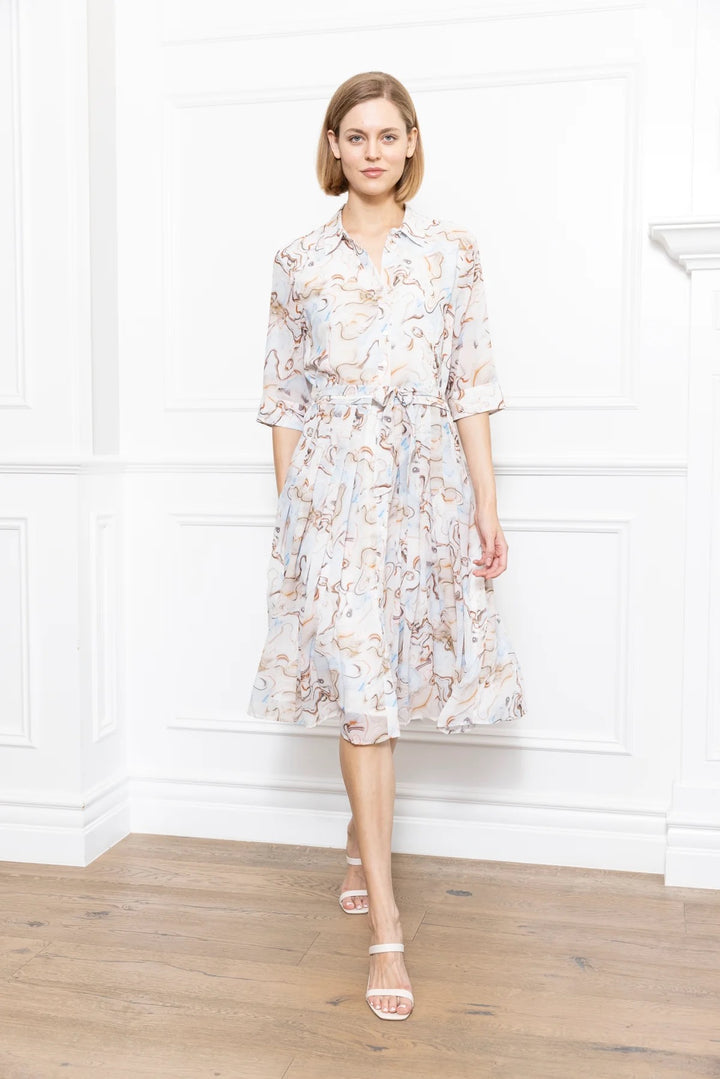 Marble print dress by Zero Degrees Celsius Inc featuring a stylish, flowing design with a fitted waist and sleeveless silhouette.