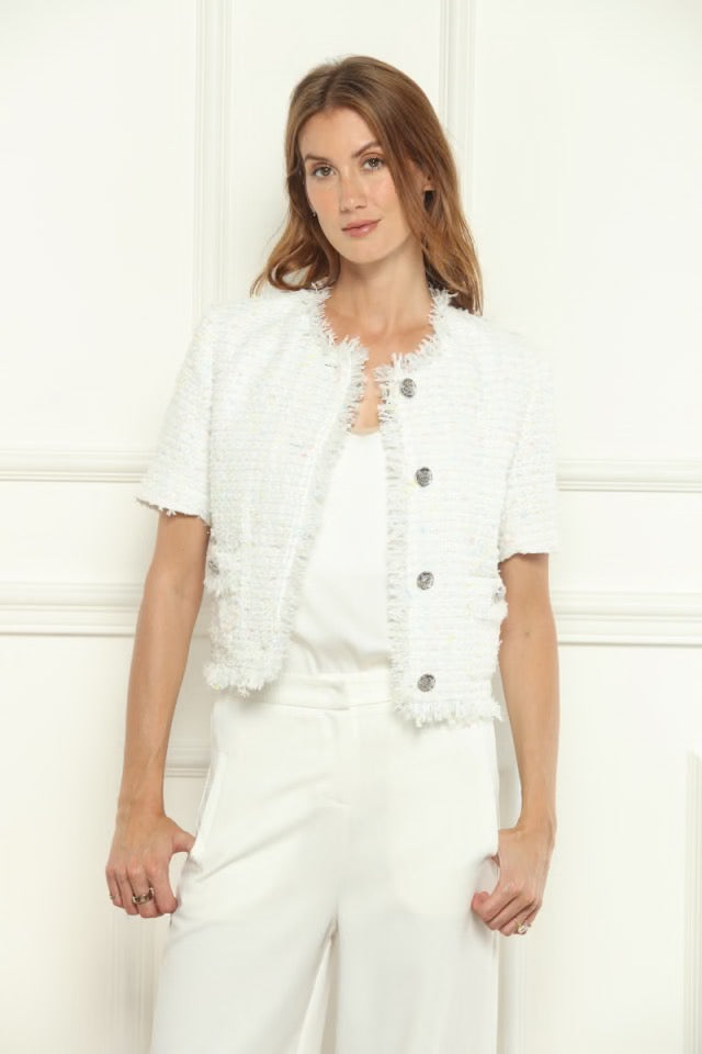 White tweed button jacket from Zero Degrees Celsius Inc, stylish tops with a textured fabric and button closure.