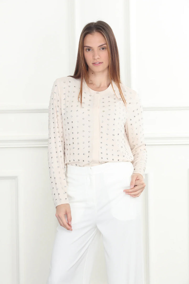 Shimmery rhinestone blouse from Zero Degrees Celsius Inc featuring intricate beadwork and a stylish fit.