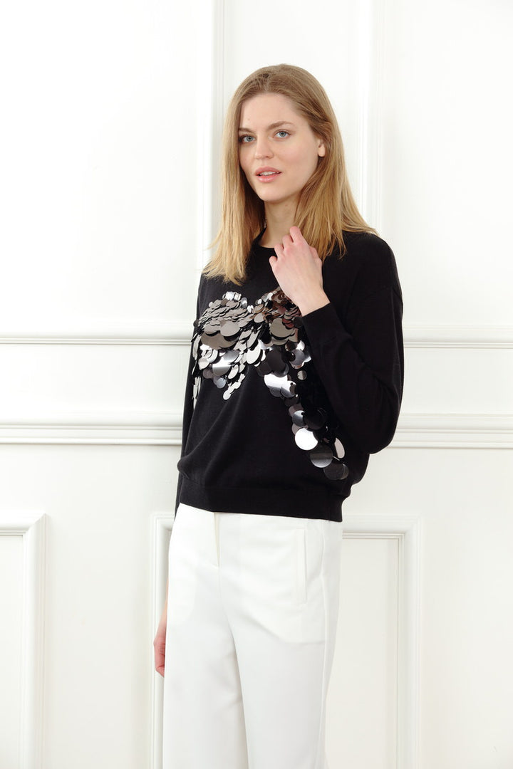Black Payette sweater by Zero Degrees Celsius Inc, stylish tops with a comfortable fit and modern design.