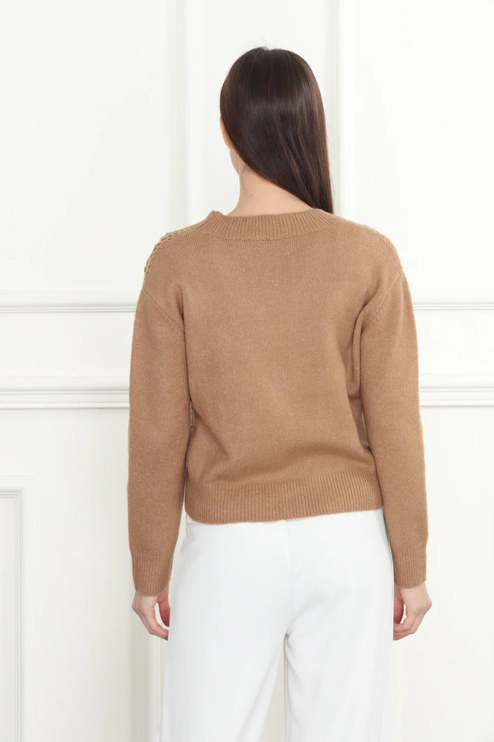 Hand-crochet cardigan by Zero Degrees Celsius Inc, featuring a cozy, textured knit design in a casual tops style.