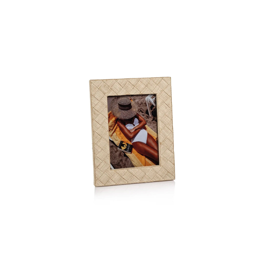 Zodax woven raffia frame for home decor, featuring a natural textured woven design suitable for wall or tabletop display.
