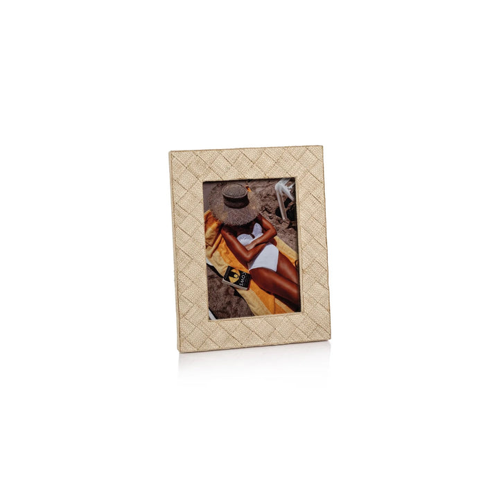 Zodax woven raffia frame for home decor, featuring a natural textured woven design suitable for wall or tabletop display.