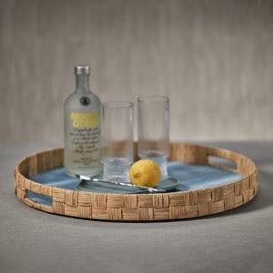 Round Zodax Abaca and silk cane tray with natural woven design, ideal for home décor and serving.