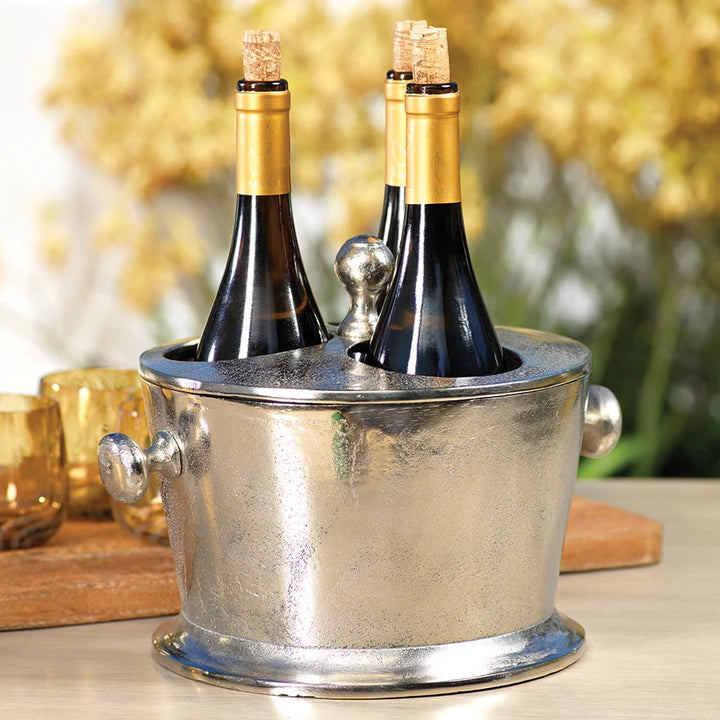 Aluminum 3-bottle holder from Zodax, designed for home use, featuring a sleek, modern structure with space for three bottles.