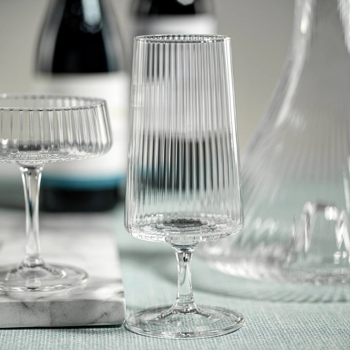 Zodax Lines Fluted Textured Cocktail Glass with elegant ridged design for serving cocktails or beverages.