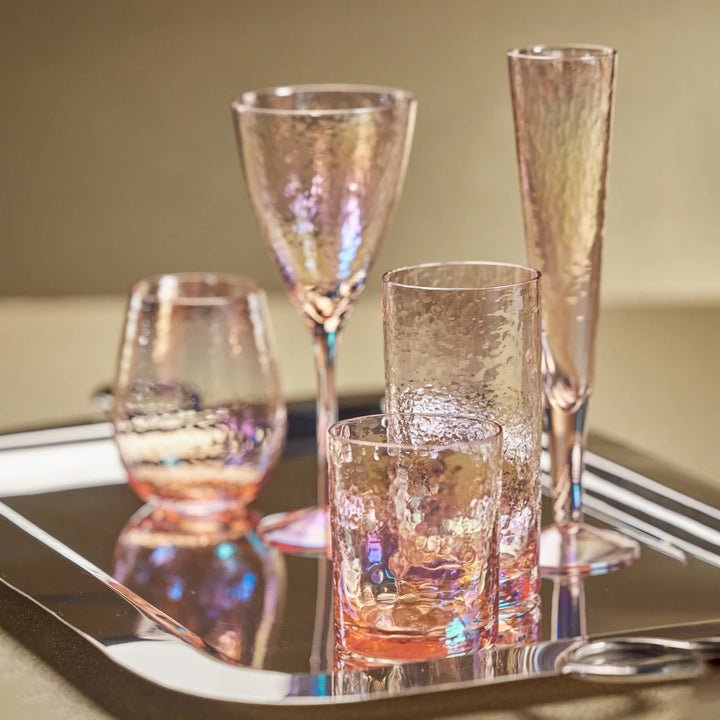 Pink Zodax Luster Stemless Glass for home use, featuring a smooth, shiny finish and modern design.