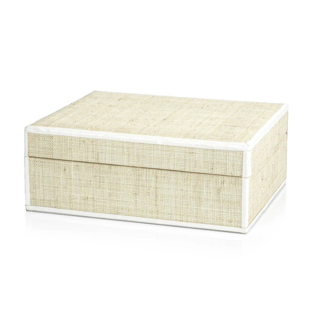 Natural raffia and leather Zodax home box with woven design and sturdy construction, ideal for stylish storage and decor.