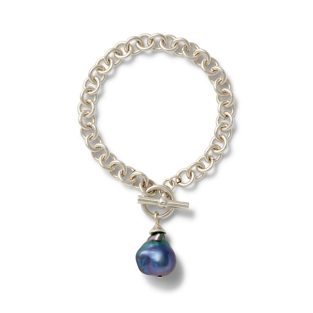 Catherine Canino Baroque silver links bracelet with intricate design, stylish accessory for elegant or casual outfits