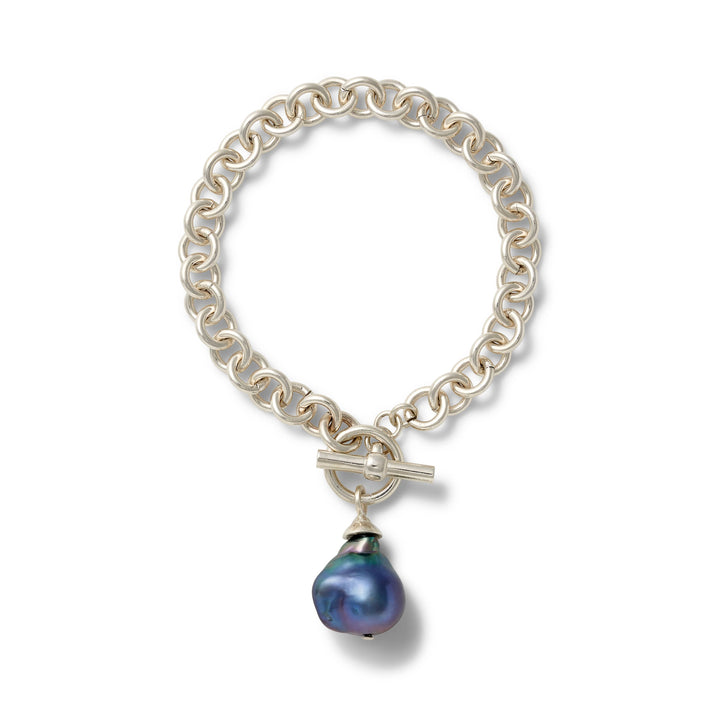 Catherine Canino Baroque silver links bracelet with intricate design, stylish accessory for elegant or casual outfits