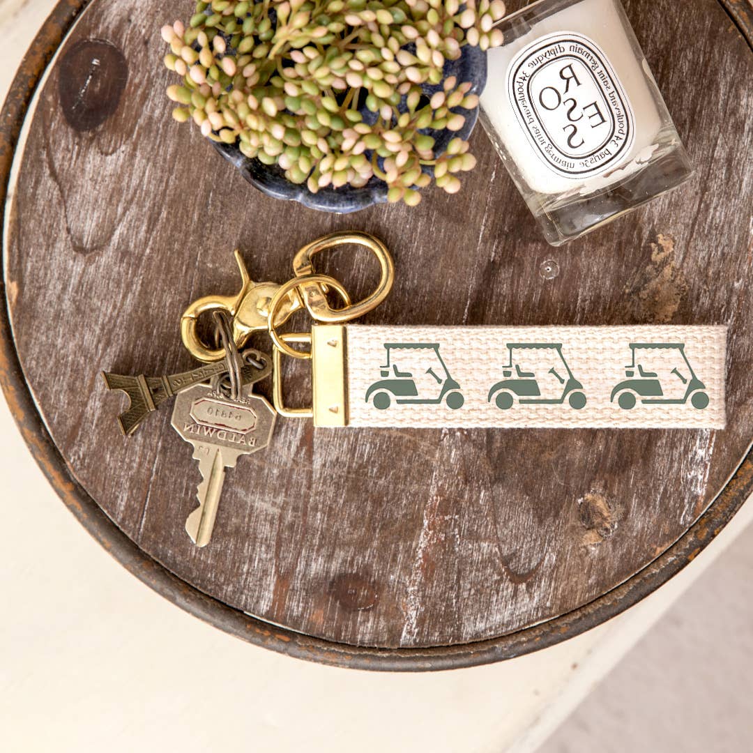 Rustic Marlin golf cart keychain gift with detailed miniature golf cart charm on a metal keyring.