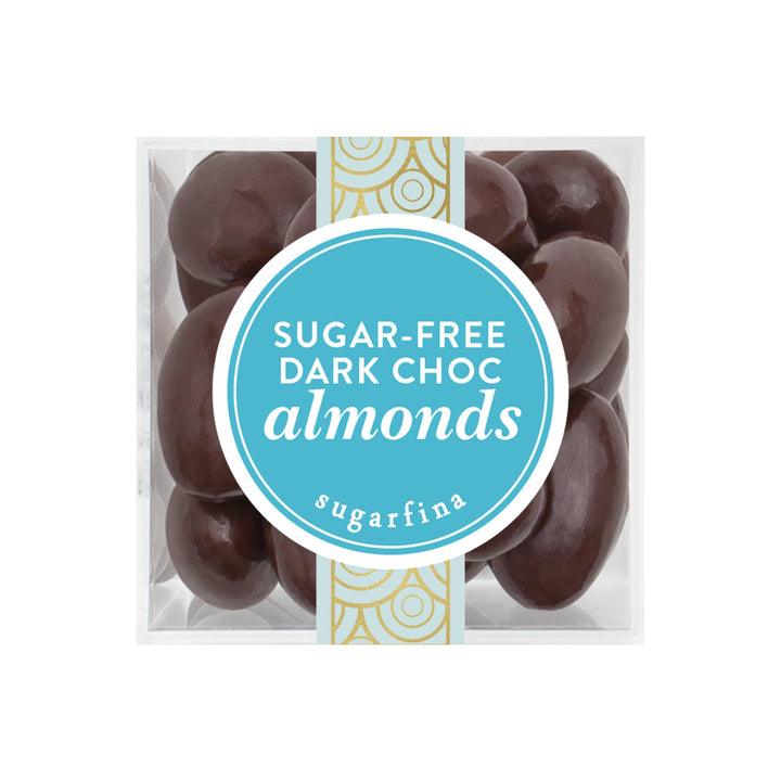 Sugarfina sugar-free dark chocolate almonds in a small gift box, showcasing glossy chocolate-covered almonds on a white background